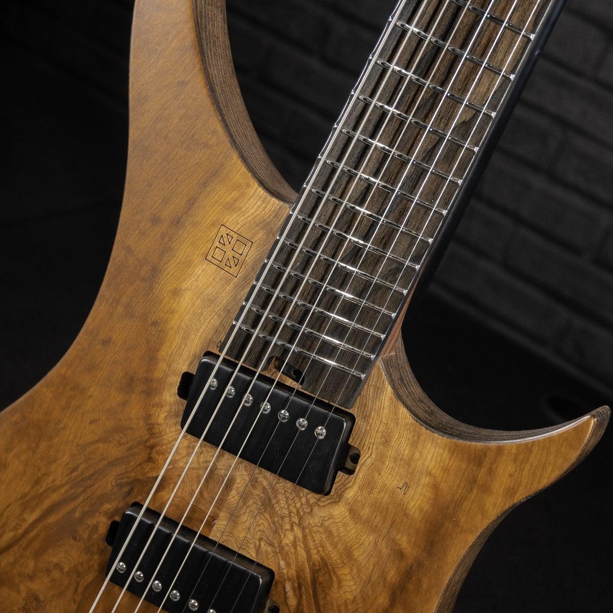 GOC Materia Headless Guitar 7 String E Series (Golden Camphor Burl) #00422 - Impulse Music Co.