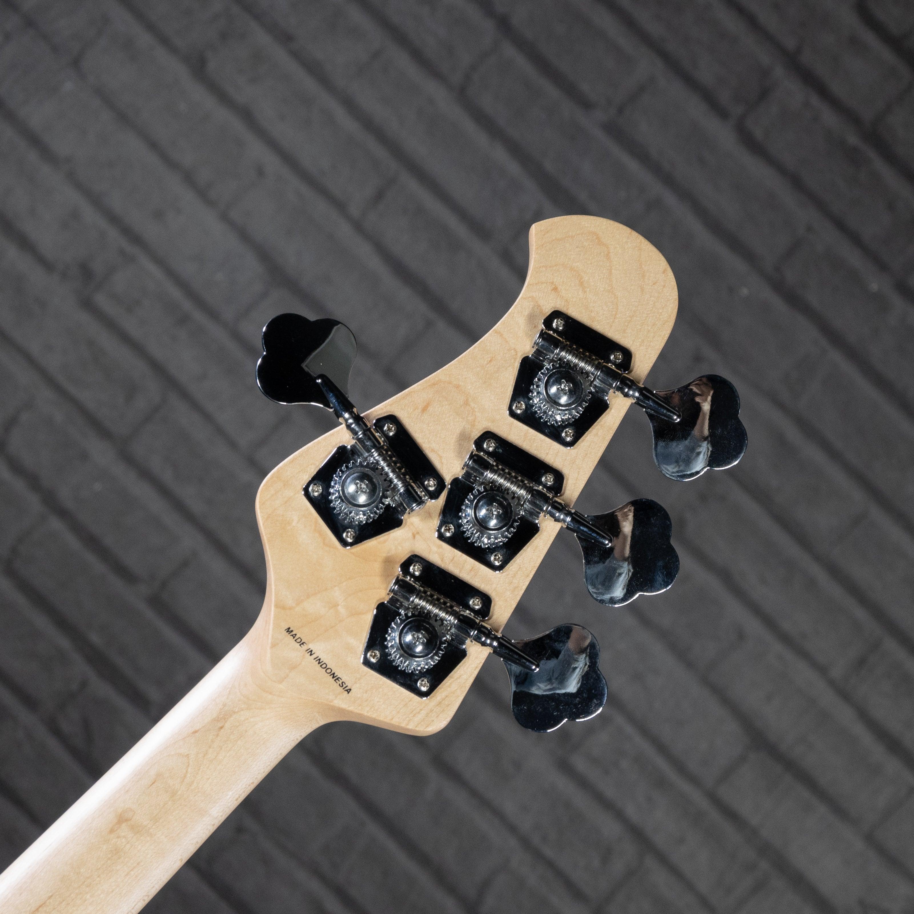 Sterling by Music Man StingRay RAY4HH Electric Bass Guitar (Candy Apple Red) - Impulse Music Co.